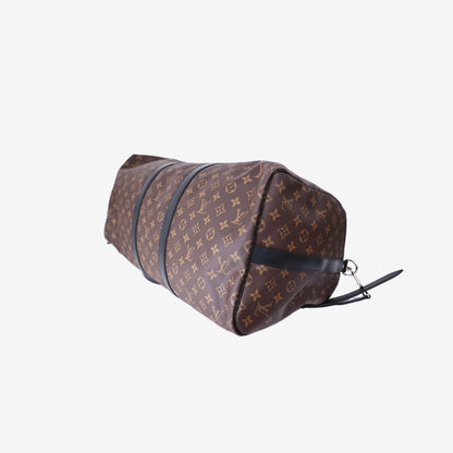 Louis Vuitton Keepall Bandoulière 55 in Monogram Macassar Coated Canvas with Black Leather and Silver Hardware