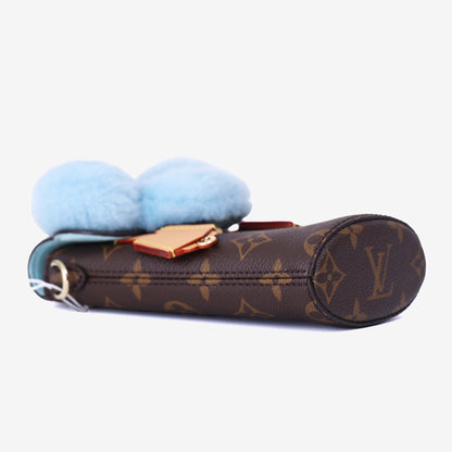 Louis Vuitton Vivienne Phone Pouch in Brown Monogram Canvas with Calfskin Leather Trim with Gold Hardware bottom side view