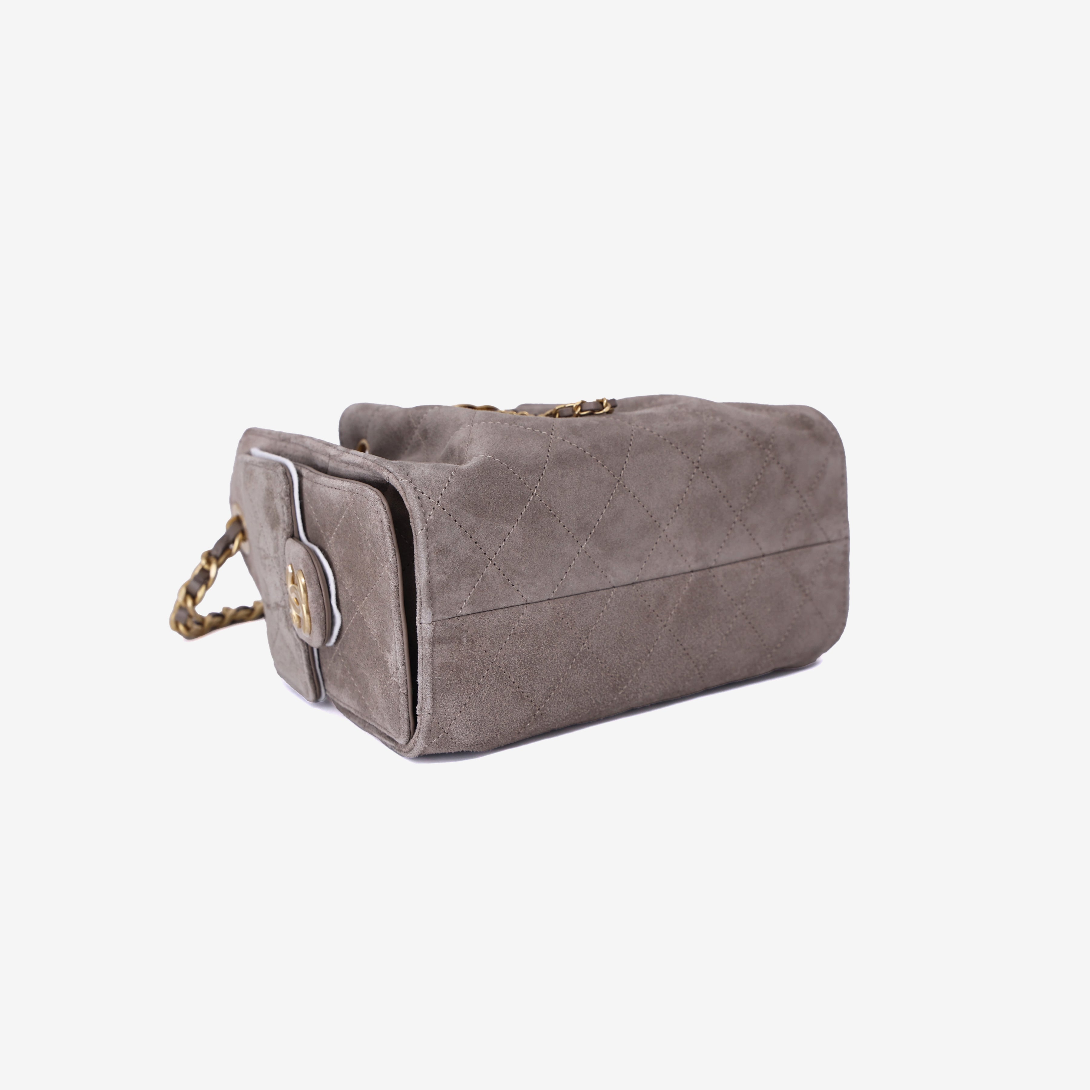 Chanel 25 Small Handbag in Dark Grey Suede with Gold Hardware bottom side view