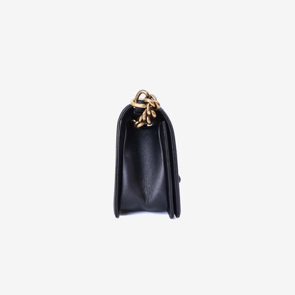 Chanel Boy Bag in Black Pony Hair Leather with Gold Hardware side view