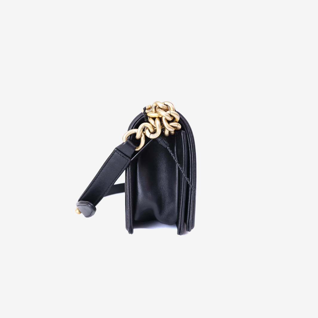 Chanel Boy Bag in Black Lambskin Leather with Gold Hardware side view
