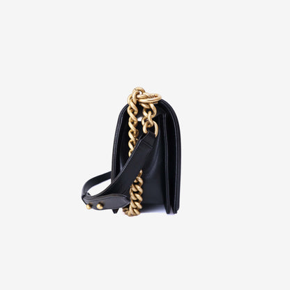 Chanel Boy Bag Medium in Black Caviar Leather with Gold Hardware side view