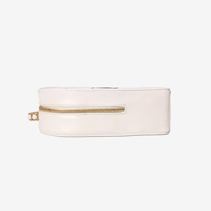 Chanel Vintage Heart-Shaped Vanity Bag in White Patent Leather with Gold Hardware bottom side view