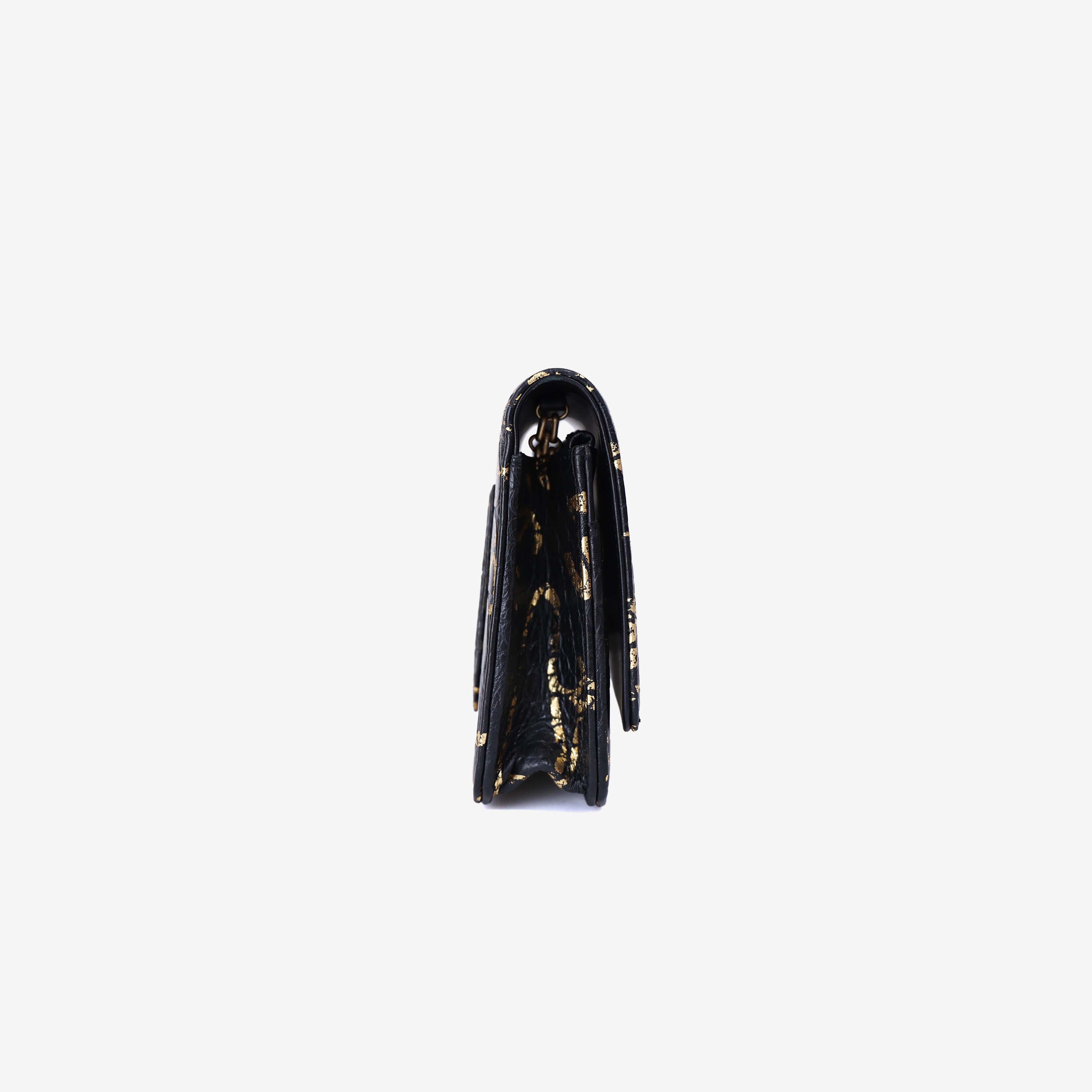Chanel 2.55 Wallet on Chain in Black Calfskin Leather with Gold Hardware side view
