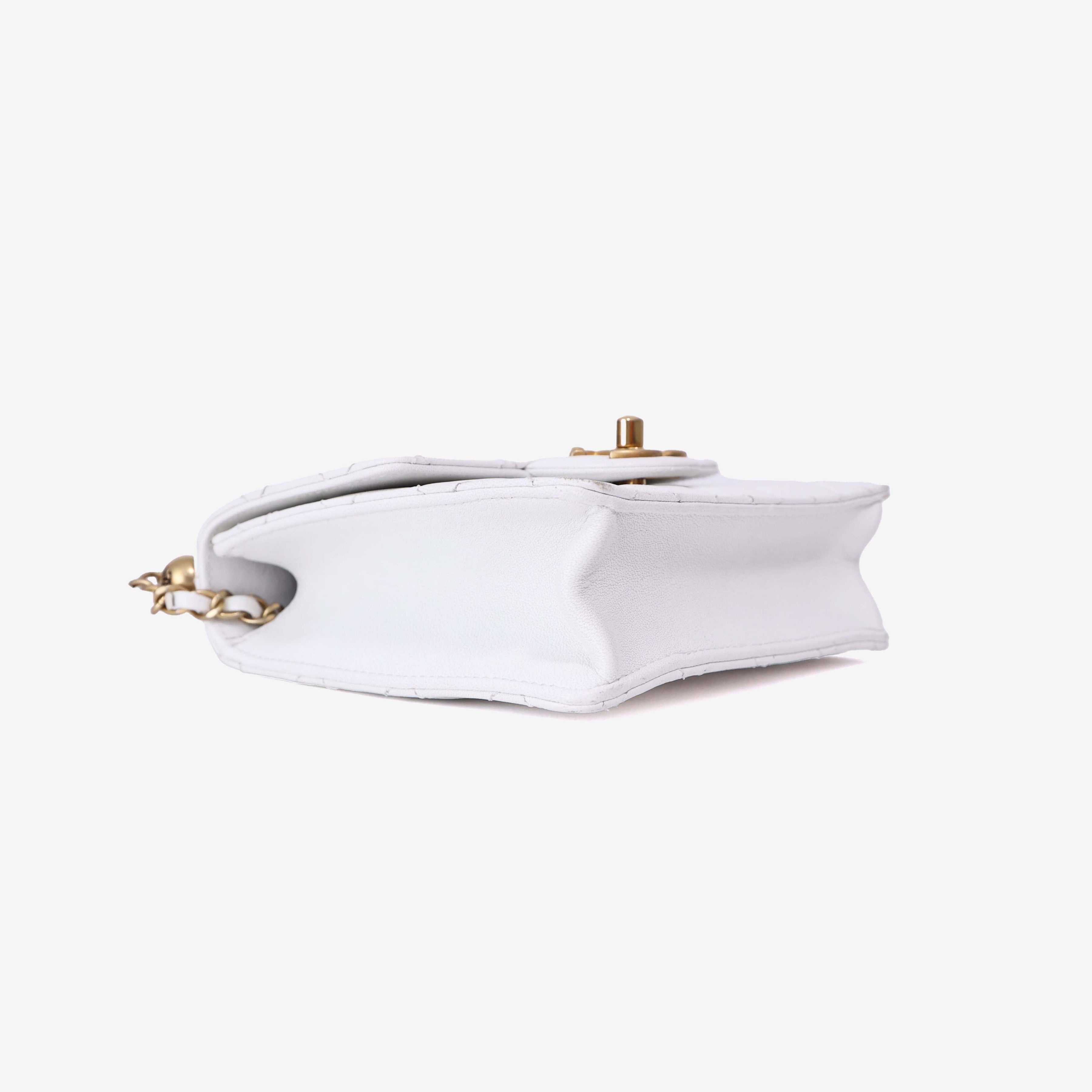 Chanel Classic Flap on Pearl Chain in White Lambskin with Gold Hardware bottom side view