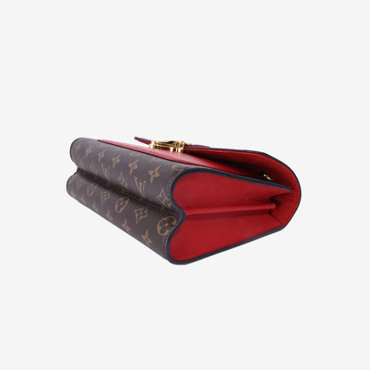 Louis Vuitton Victoire Bag in Monogram Coated Canvas/Red Leather with Gold Hardware