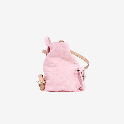 Louis Vuitton Venice Backpack in Washed Pink Denim side view