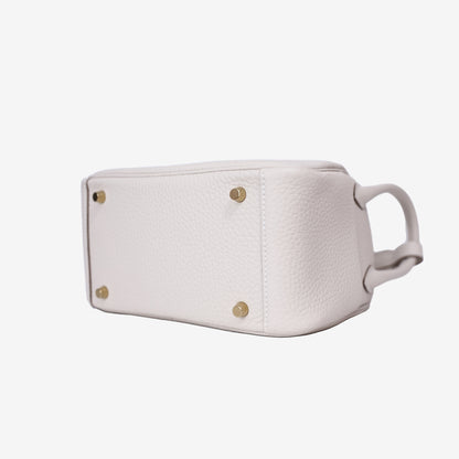 Hermès Mini Lindy in Craie Clemence Leather with Gold Hardware bottom side view
