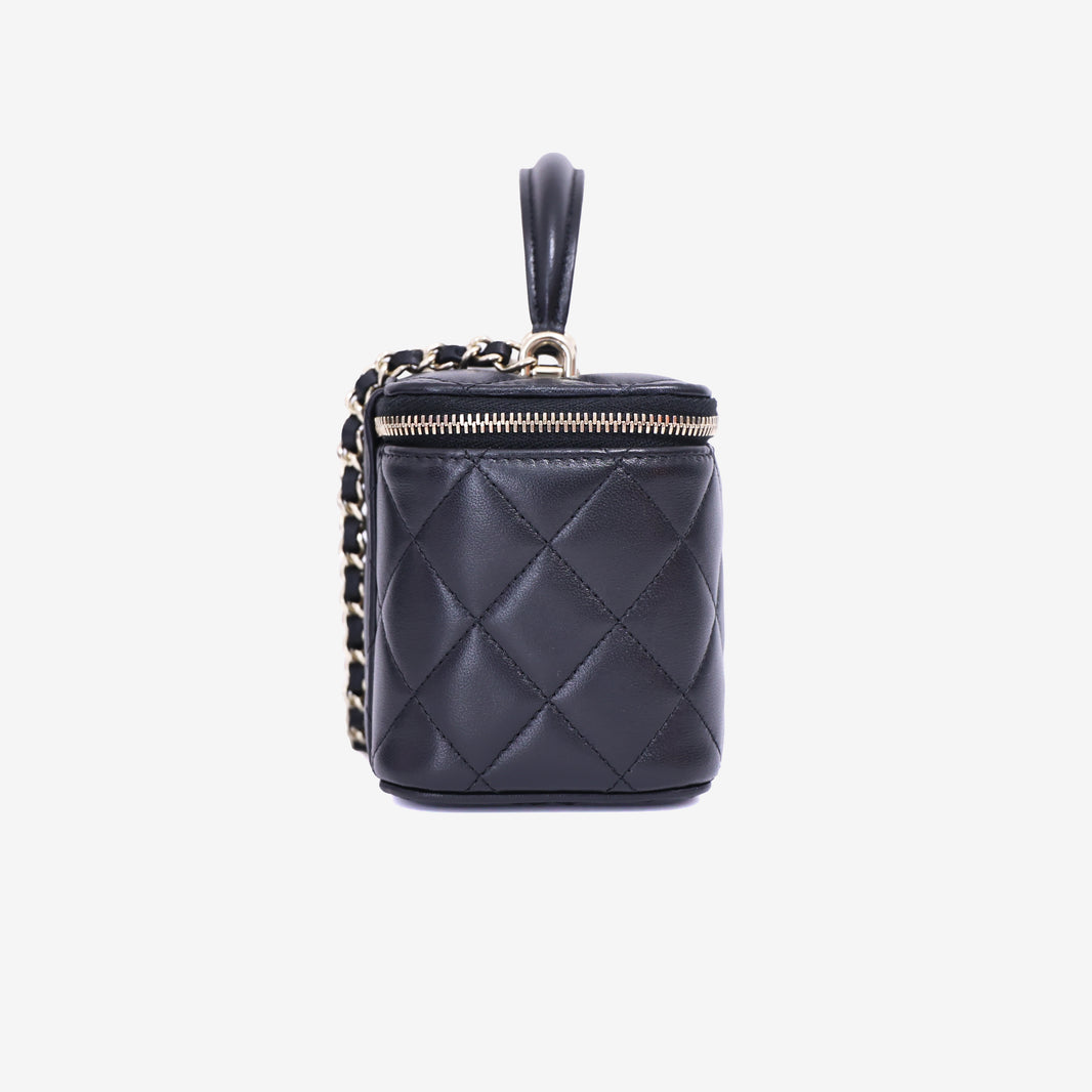 Chanel Vanity Case with Top Handle in Black Lambskin Leather with Gold Hardware side view