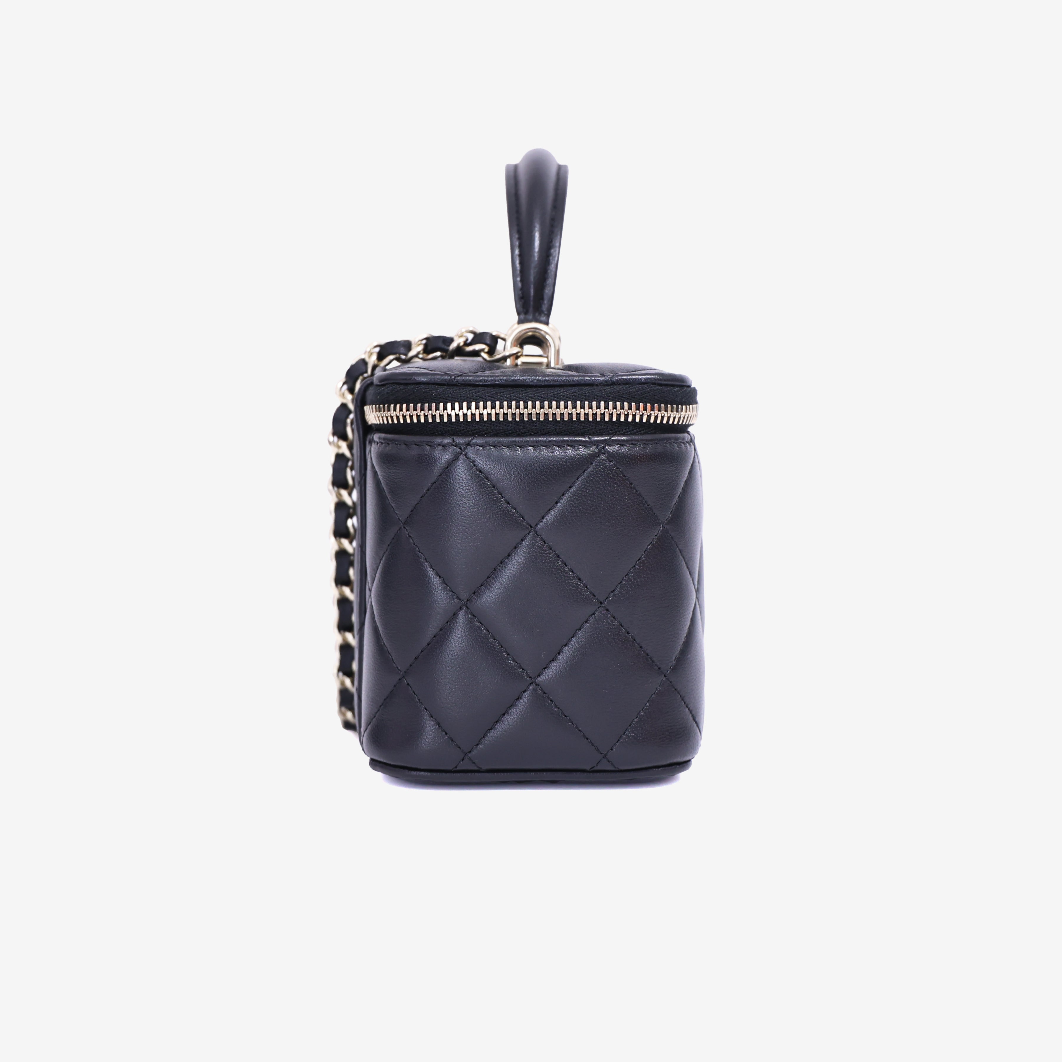Chanel Vanity Case with Top Handle in Black Lambskin Leather with Gold Hardware side view