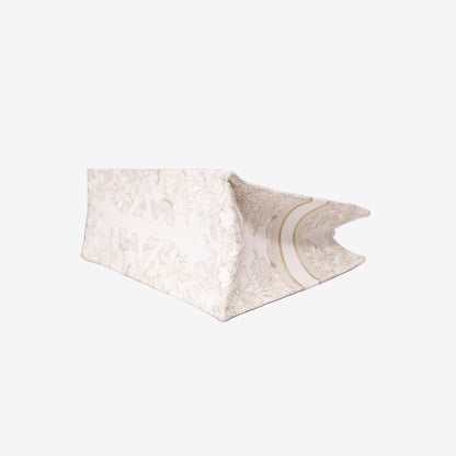 Dior Book Tote Medium in Latte Toile de Jouy Embroidered Cotton with Gold Detailing bottom side view