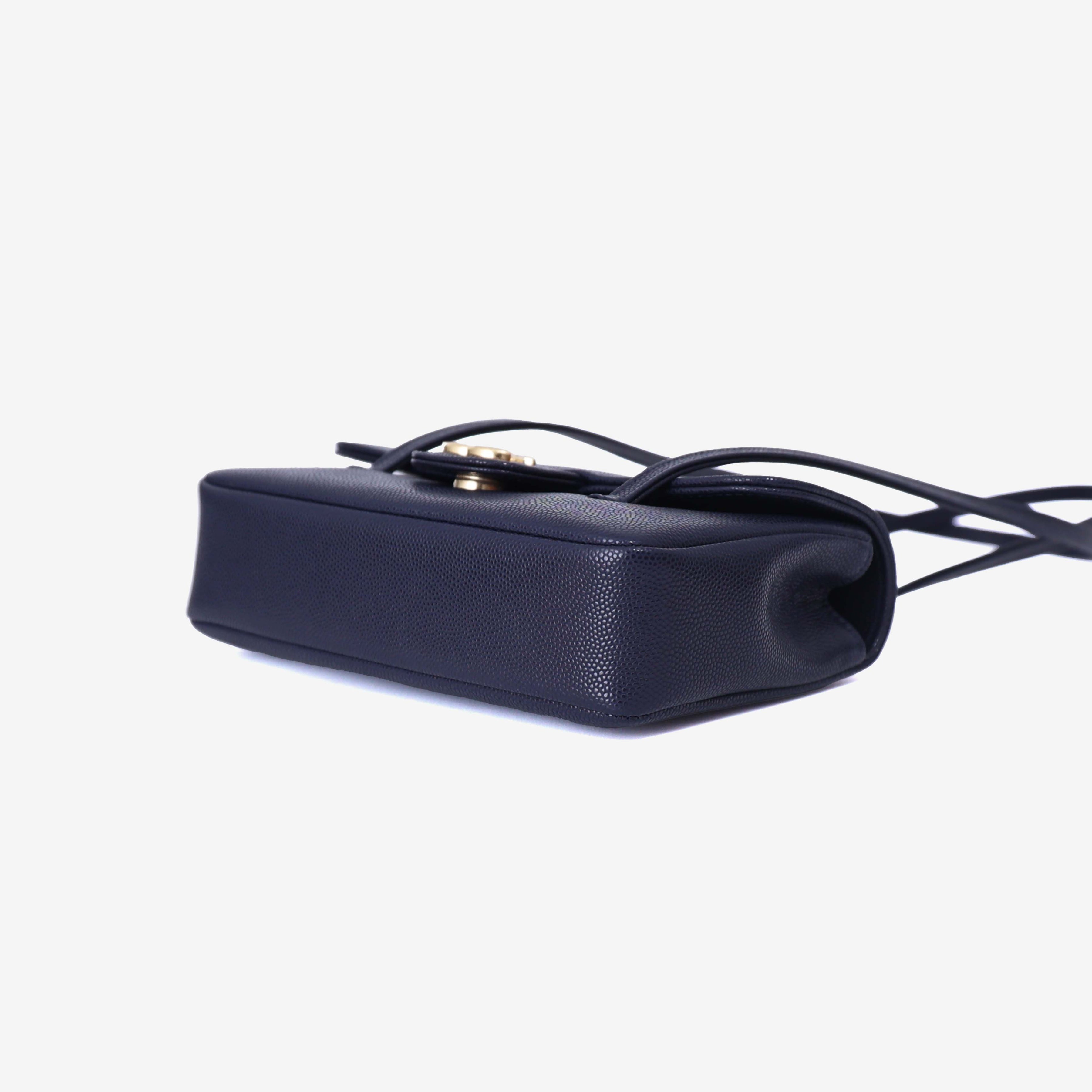 Chanel 26P Preppy Flap Mini in Navy Calfskin Leather with Gold Hardware bottom side view