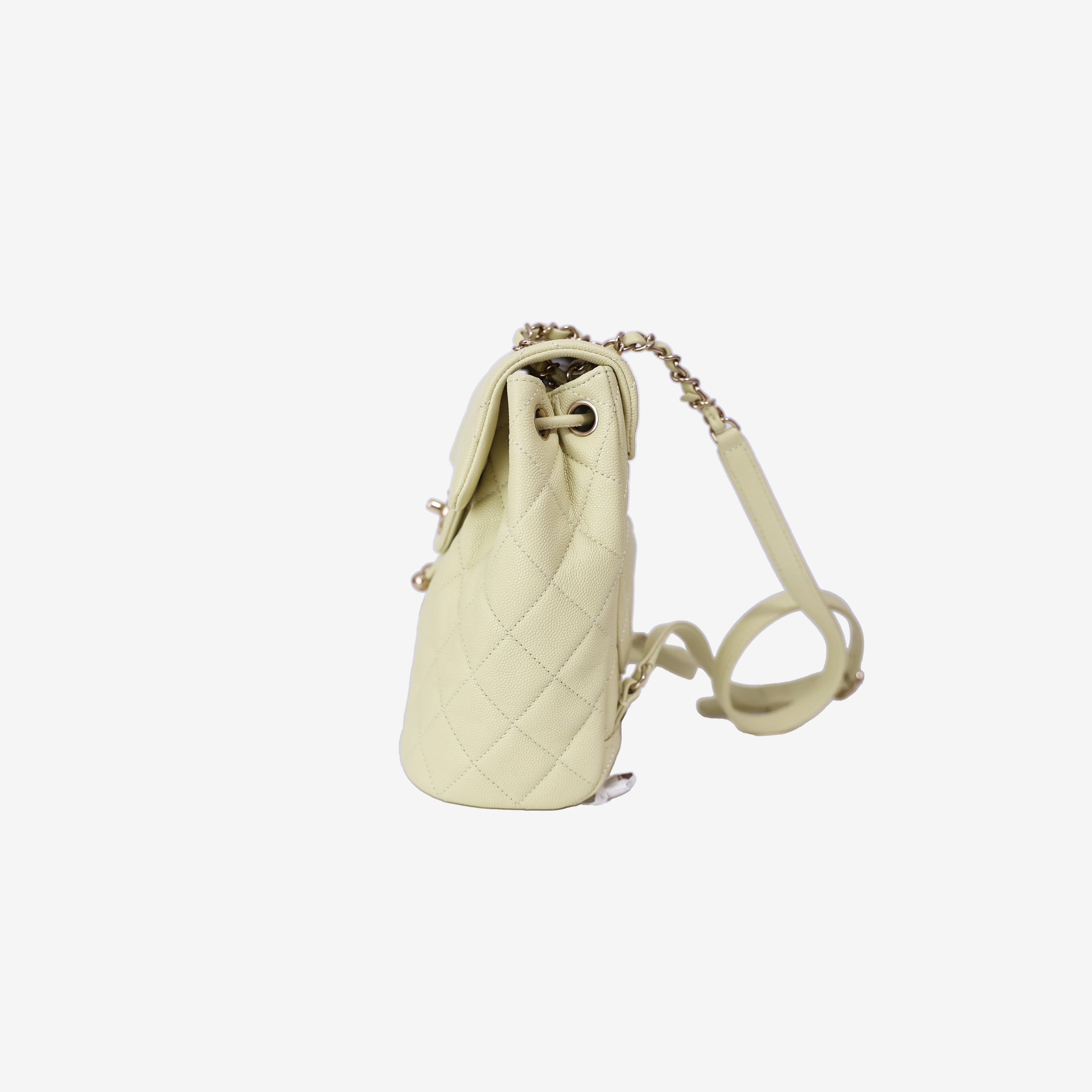 Chanel Urban Spirit Mini Backpack in Light Yellow Caviar Leather with Silver Hardware side view