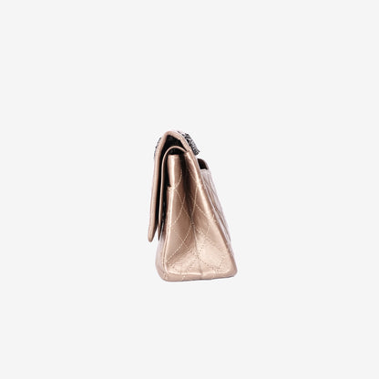 Chanel 2.55 Reissue Maxi Double Flap Bag in Metallic Champagne Lambskin Leather with Ruthenium Hardware
