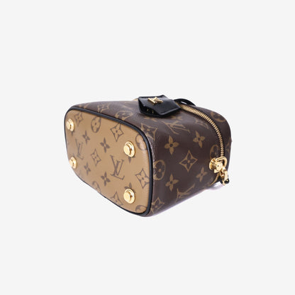 Louis Vuitton Vanity PM Handbag in Monogram/Reverse Monogram Coated Canvas with Gold Hardware