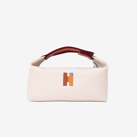Hermès Bride-a-Brac H Pavillon Case in Naturel Cotton Canvas front view