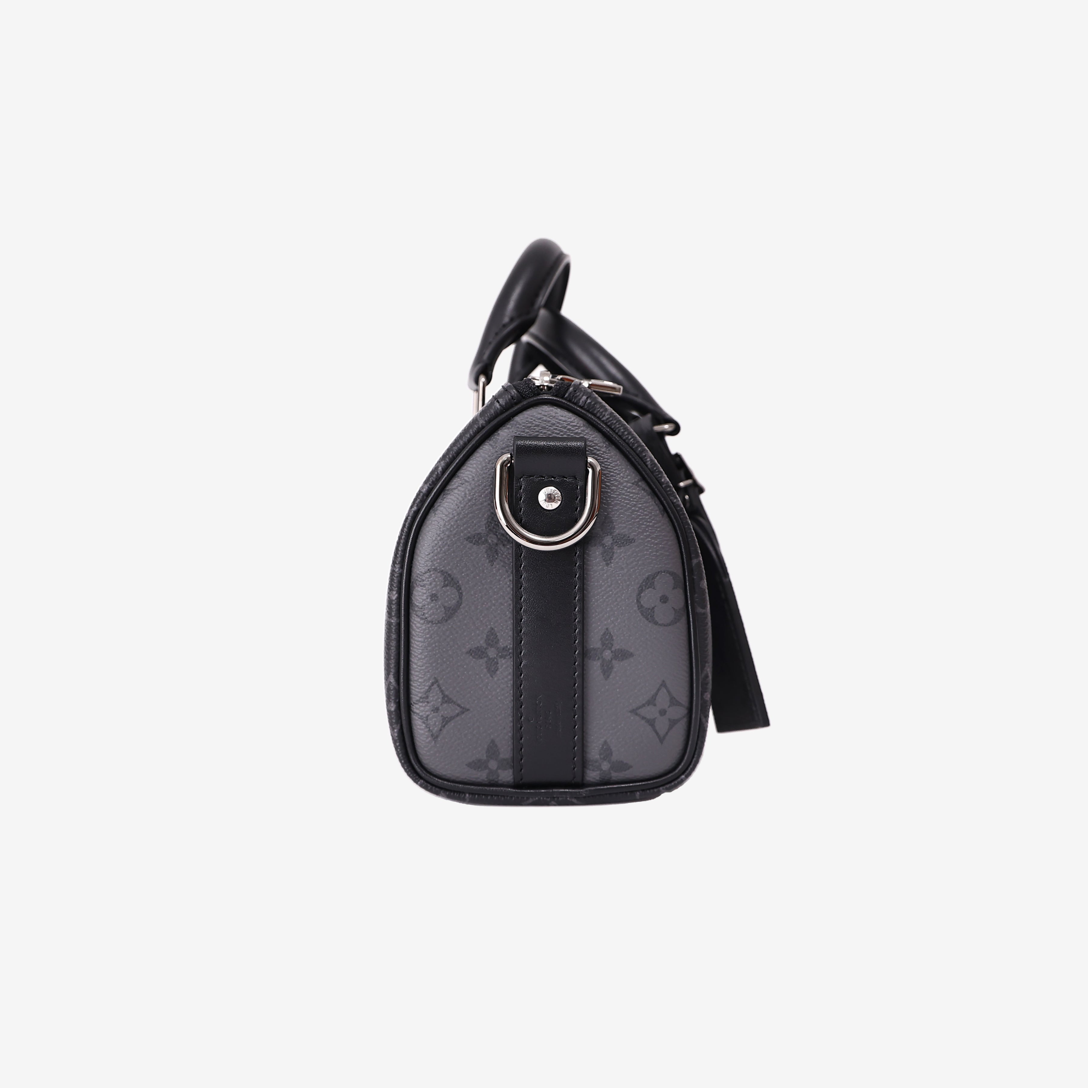 Louis Vuitton Keepall 25 in Monogram Eclipse Reverse Canvas with Black Leather Trim side view