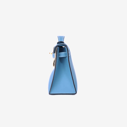 Hermès Kelly Pochette in Bleu Jean Swift Leather with Gold Hardware side view