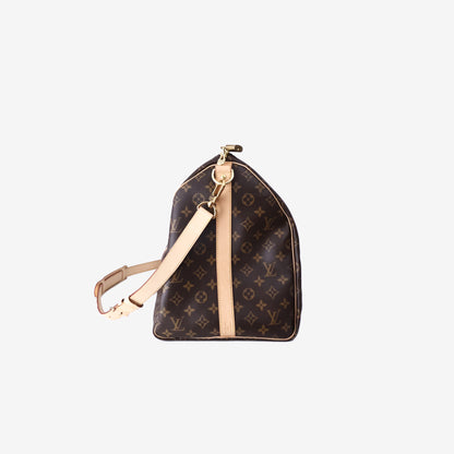 Louis Vuitton Keepall Bandoulière Travel Bag 55 in Brown Monogram Coated Canvas with Gold Hardware