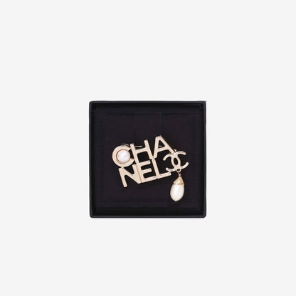 Chanel Logo Pearl Brooch in Light Gold with Resin Pearls