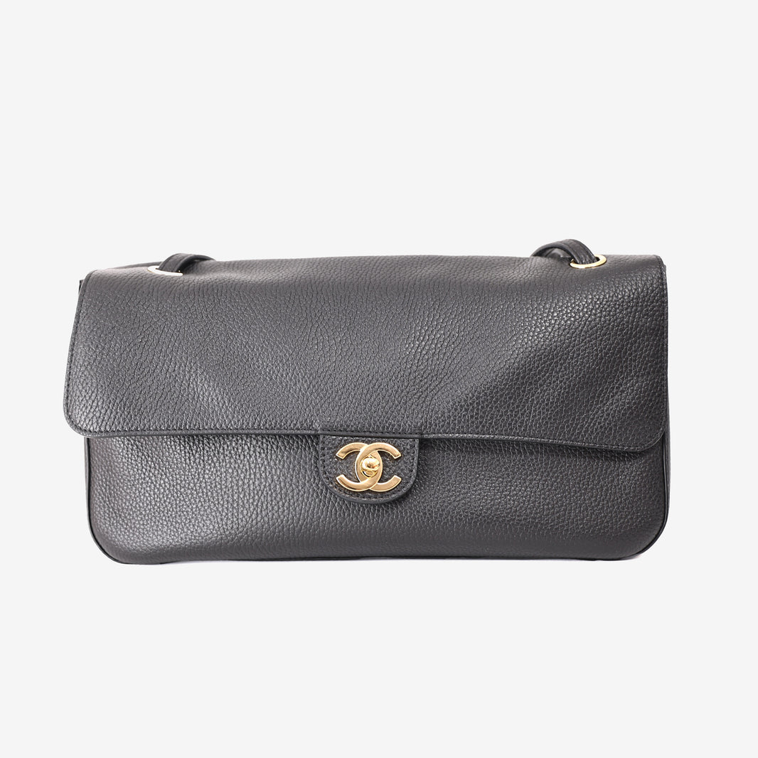 Chanel Maxi Flap Bag in Black Grained Calfskin Leather with Gold Hardware
