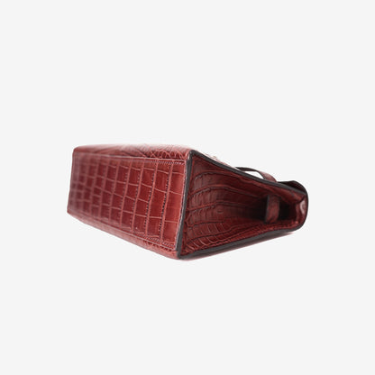 Hermès Kelly Pochette in Burgundy Matte Crocodile Leather with Gold-Plated Hardware