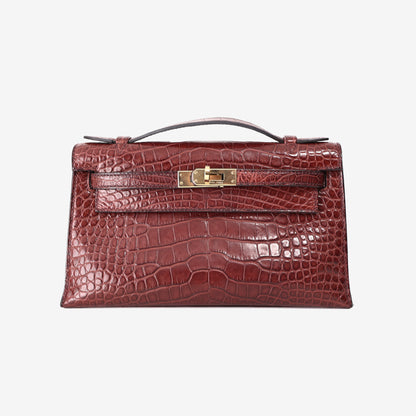 Hermès Kelly Pochette in Burgundy Matte Crocodile Leather with Gold-Plated Hardware